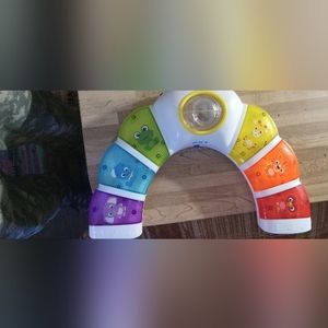 Baby Einstein glow and discover light bar activity station